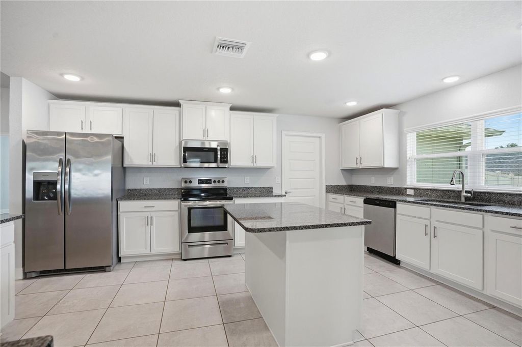 Photo of 12847 Hilary Street, Spring Hill, FL 34609 (MLS # TB8514213)