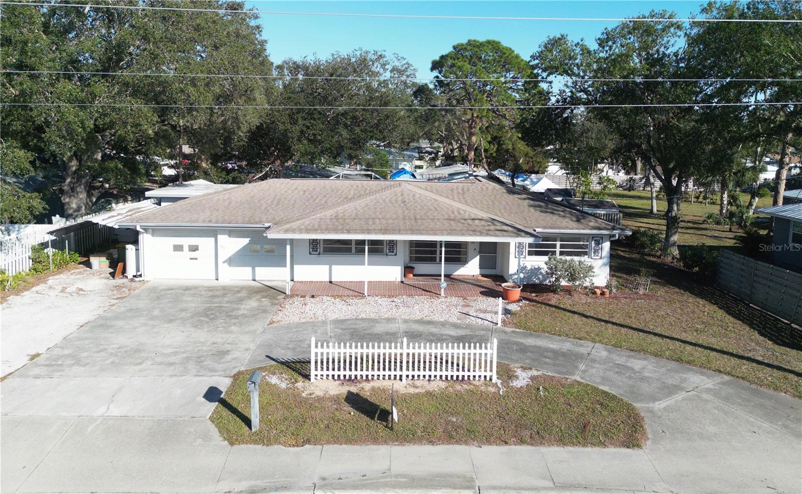 This is the One! *Discover this beautifully maintained 3-bedroom, 2-bath home, complete with a potential mother-in-law suite*Nestled in a fantastic location near the world-famous Pinecraft community and just minutes from vibrant Downtown Sarasota, this property is a true gem*Sitting on an oversized lot, the home features a circular driveway and a spacious 2-car garage. Enjoy the enclosed porch area—perfect for relaxing or entertaining guests*For outdoor enthusiasts, the nearby Legacy Trail offers endless opportunities for walking, jogging, or cycling while soaking in the beauty of nature*In addition to its unbeatable location, this home provides convenient access to top-rated schools, an array of restaurants, diverse shopping destinations, renowned medical facilities, I-75, stunning beaches, and abundant entertainment options*Embrace a lifestyle of convenience, leisure, and excitement! Don’t miss this incredible opportunity to make this exceptional property your own*