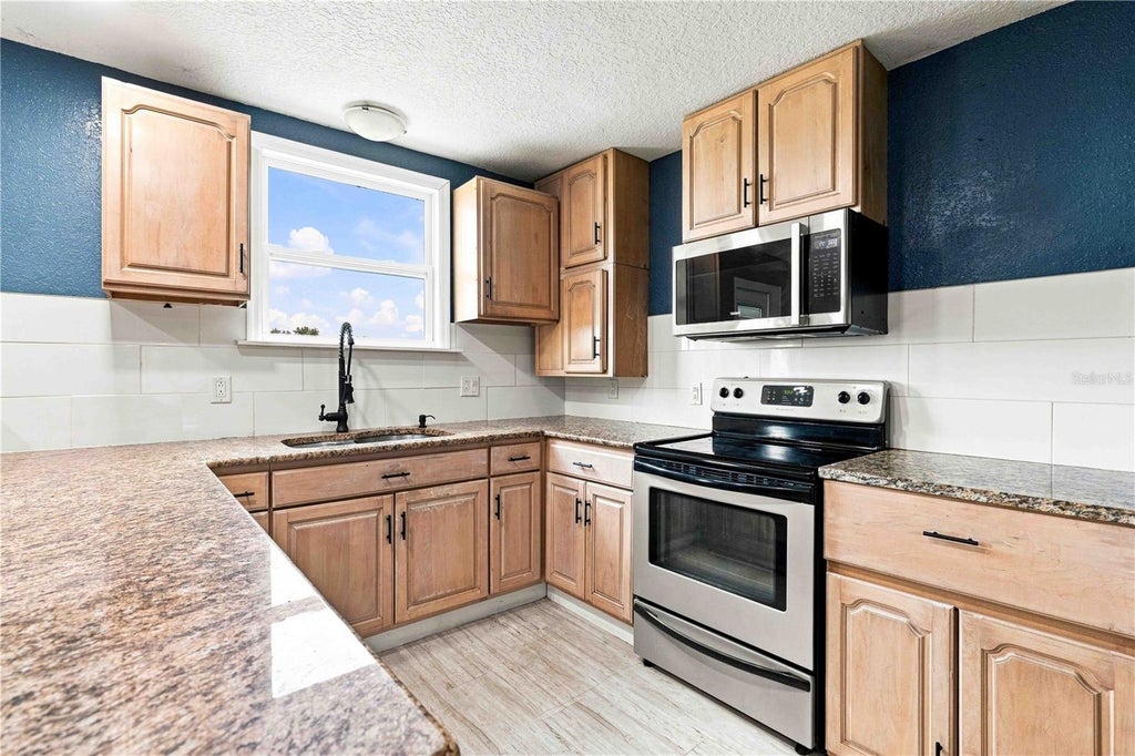 Photo of 951 State Road 64 E, Wauchula, FL 33873 (MLS # A4706101)