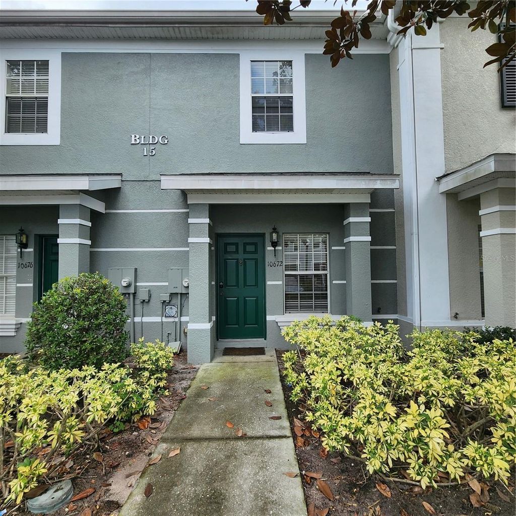 Photo of 10672 Savannah Wood Drive #101, Orlando, FL 32832 (MLS # O6387334)