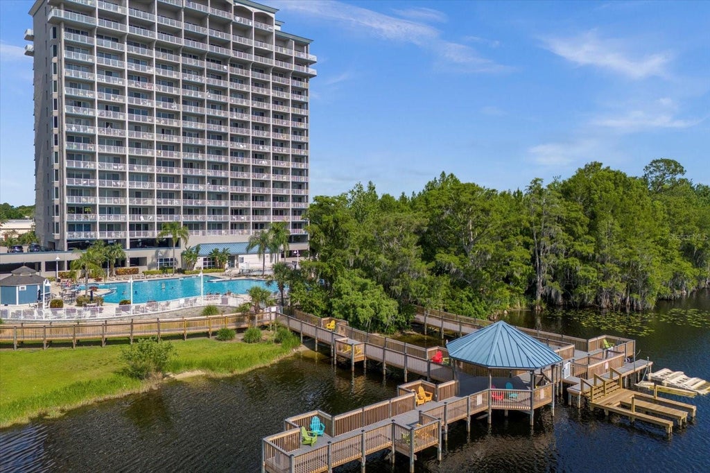 Photo of 13415 Blue Heron Beach Drive #308, Orlando, FL 32821 (MLS # O6451745)