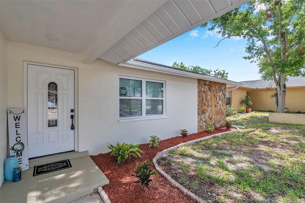 Photo of 2585 Ridge Lane, Palm Harbor, FL 34684 (MLS # TB8406038)