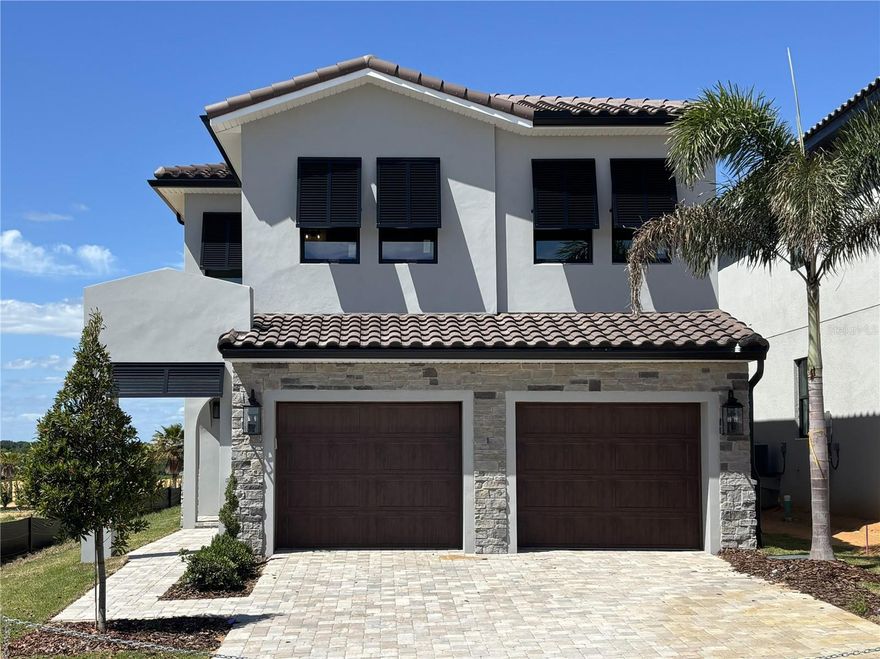 Under Construction. Set along Bella Collina’s signature 1st tee box, this luxury two-story home by Wilmington Homes offers 3,159 square feet of sophisticated golf course living. Designed with an open layout and seamless indoor-outdoor connection, the main living area flows through large sliding doors to a covered lanai with summer kitchen, ebony tongue-and-groove ceiling, and motorized screens. Outside, a resort-style pool with sunshelf creates a private escape for lounging and entertaining.

The gourmet kitchen features quartz countertops, Wolf and Sub-Zero appliances, and a walk-in pantry, while engineered hardwood flooring and upgraded lighting add warmth and character. The owner’s suite upstairs includes a private balcony spanning the back of the home with sweeping views of the #1 tee box and fairway. Additional features include a golf cart charging station, upgraded insulation package, and 2-car garage.

Enjoy access to Bella Collina’s award-winning amenities including the iconic Tuscan clubhouse, championship Nick Faldo–designed golf course, resort pool, fitness center, spa, tennis courts, walking trails, dining venues, and a vibrant year-round social calendar—all within one of Florida’s most picturesque settings.

Contact us today to arrange your private showing and experience the luxury, beauty, and lifestyle that only Bella Collina can offer. Developer will Defer the $40,000 Sports Membership Deposit.