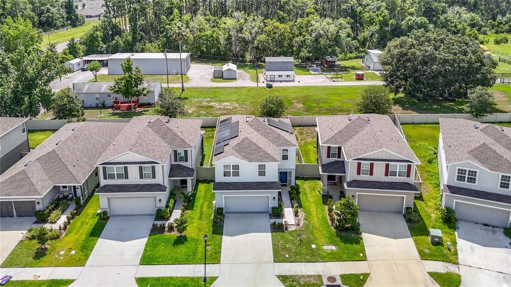 Photo of 10699 Old Sycamore Loop, Land O Lakes, FL 34638 (MLS # TB8521150)