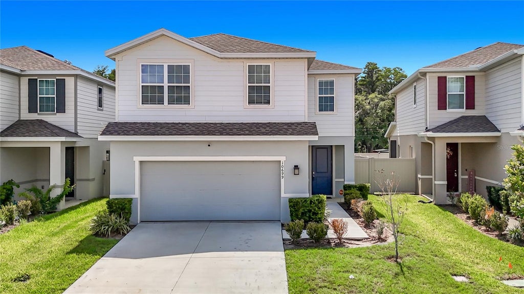 Photo of 10699 Old Sycamore Loop, Land O Lakes, FL 34638 (MLS # TB8521150)