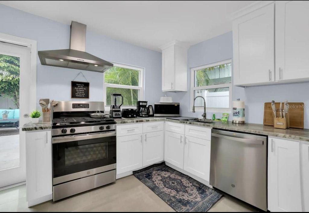 Photo of 1210 Bay Palm Boulevard, Indian Rocks Beach, FL 33785 (MLS # TB8387541)