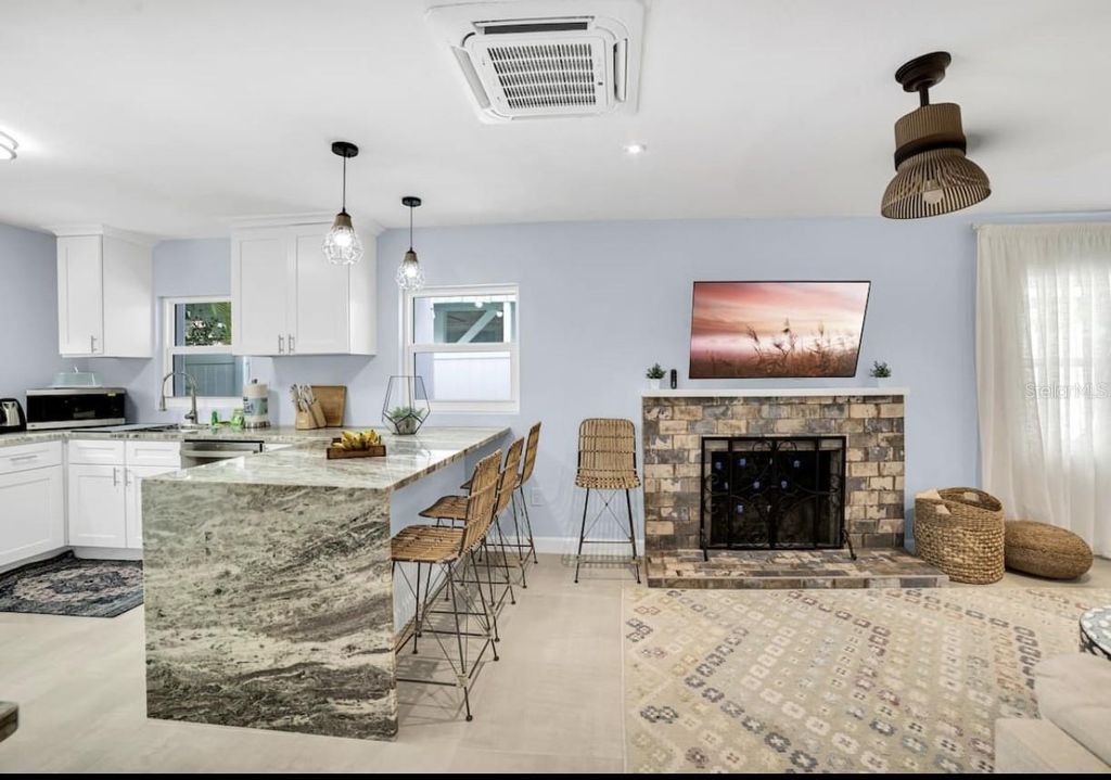 Photo of 1210 Bay Palm Boulevard, Indian Rocks Beach, FL 33785 (MLS # TB8387541)