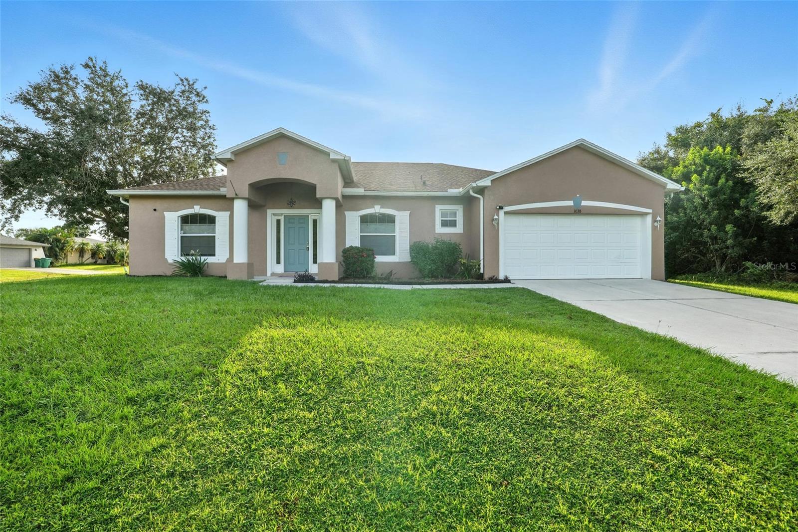 Welcome to your Florida retreat! This beautifully maintained 4 bedroom, 2 bath plus den pool home sits on an oversized corner lot and is not in a flood zone. Thoughtful updates include a 2022 roof, 2021 AC, fresh paint, and newer pool cage screening (2022), giving you peace of mind from day one. Inside, the kitchen’s open floor plan offers abundant cabinet space and a pantry, overlooking the dining and living areas filled with natural light. The split floor plan ensures privacy, while the spacious primary suite features a generous closet. Tile and newer woodland oak floor run throughout, and the convenient indoor laundry room makes everyday living easy. Step out to your private lanai where a sparkling pool and dedicated pool bath set the stage for fun filled gatherings and relaxing afternoons. The epoxy finished 2 car garage adds both style and function. Perfectly located near kayaking spots, pristine beaches, and just a short drive to charming downtown Punta Gorda and Fishermen’s Village, this home lets you enjoy the best of Florida living. Move in ready and full of charm, this one won’t last long so schedule your showing today!