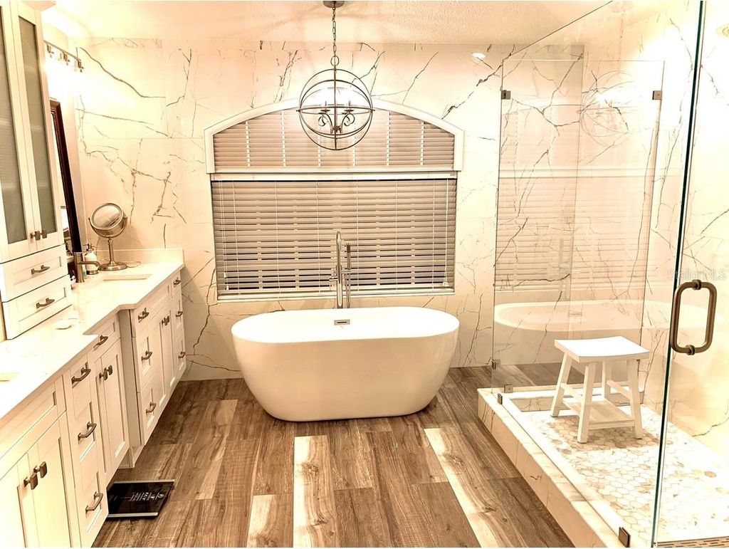 Photo of 9741 Wilsky Boulevard, Tampa, FL 33615 (MLS # TB8452179)