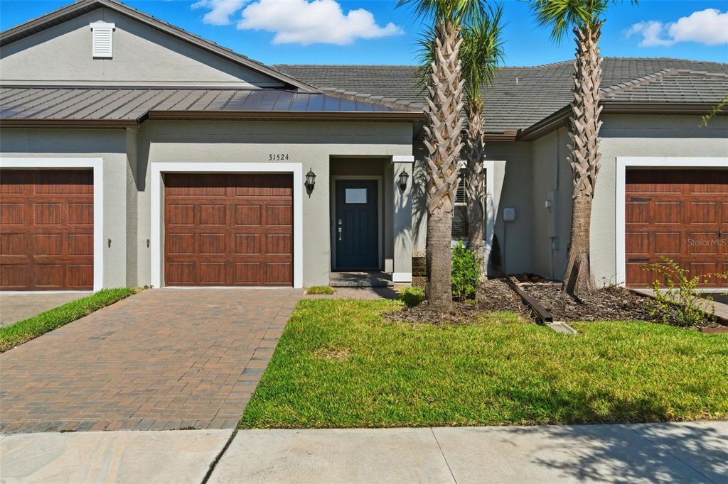 Photo of 31524 Magna Gulf Loop, San Antonio, FL 33576 (MLS # TB8439371)