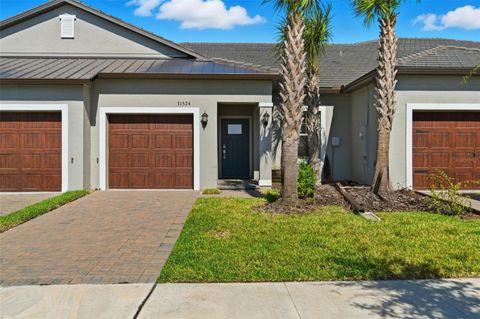 Photo of 31524 Magna Gulf Loop, San Antonio, FL 33576 (MLS # TB8439371)