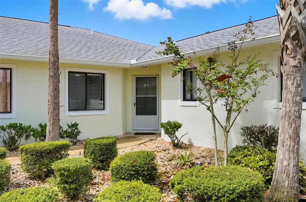 Photo of 47 Lake Forest Place, Palm Coast, FL 32137 (MLS # FC313136)
