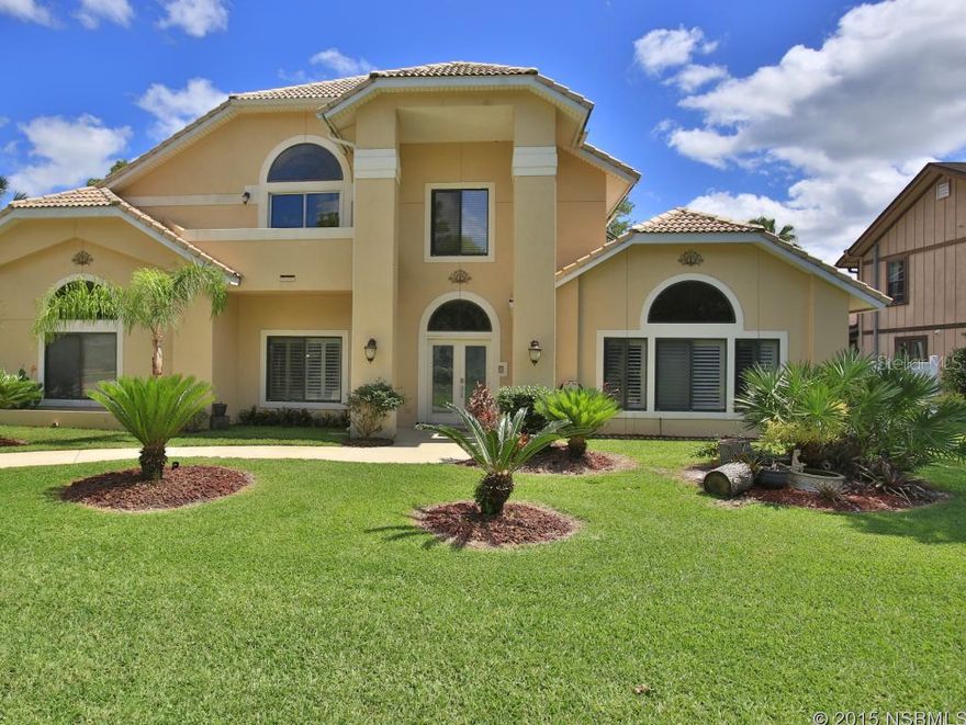 Gorgeous 4BR/3BA contemporary home has been fully renovated with upgraded finishes throughout. Elegant contemporary features and details give this home European style with modern functionality. Split-face stone highlights the Travertine flooring throughout the living spaces. Wood floors warm the Dining Room and Media/Family room. French doors lead to a screened pool and spa, w/entertaining area, & the Master Suite balcony overlooks the pool. The Master Suite features a walk in shower & soaker tub, & his & hers vanities/sinks & a large walk in closet. Decorative tile and surfaces complete the refined design. The attached Hangar is 48ftx35ft and has a 48ftx12ft door opening lots of storage & RV door. A Gourmet Kitchen boasts a wall of refrigeration, gas cook top, wall ovens all in stainless steel. ;Water: City