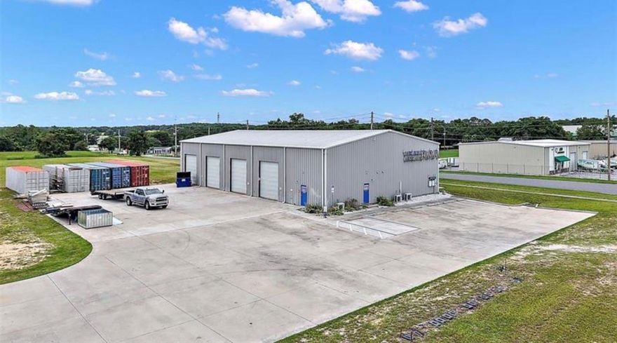 SITE READY 5.76 ACRES, Currently Engineered and APPROVED to Accommodate 4 Office/Warehouse Buildings up to 82,500 square feet. All the infrastructure is in place: 36 Water Meters, city sewer and water, and a master off-site storm water retention is in place. 3-phase power is available, and natural gas is close by. The 6500 Sq Feet WAREHOUSE was built in 2019 and has finished office space and bathrooms. Air-conditioned space of 1,600 square feet, 4 bay doors, doors are 14 feet high, 12 feet wide, ceiling height 23 feet. 5 Office Spaces,1 Conference room, and 2 bathrooms. With easy access to I-75 and the Florida Turnpike, located a half mile off Hwy 27/441, with other major roads out of the area. In this location, you're just minutes from the Villages! MASTER CONCEPTUAL PLAN is attached for all the potential this site delivers! INVESTMENT OPPORTUNITY FOR YOUR INDUSTRIAL/ OFFICE-WAREHOUSE LAND IN CENTRAL FLORIDA!