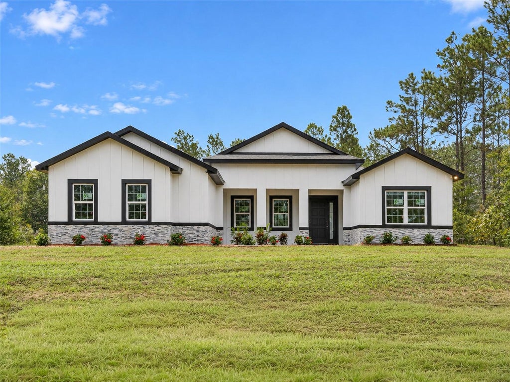 Photo of 12577 SW 64th Lane, Ocala, FL 34481 (MLS # O6449896)
