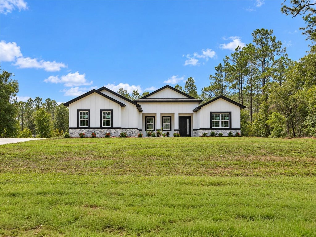 Photo of 12577 SW 64th Lane, Ocala, FL 34481 (MLS # O6449896)