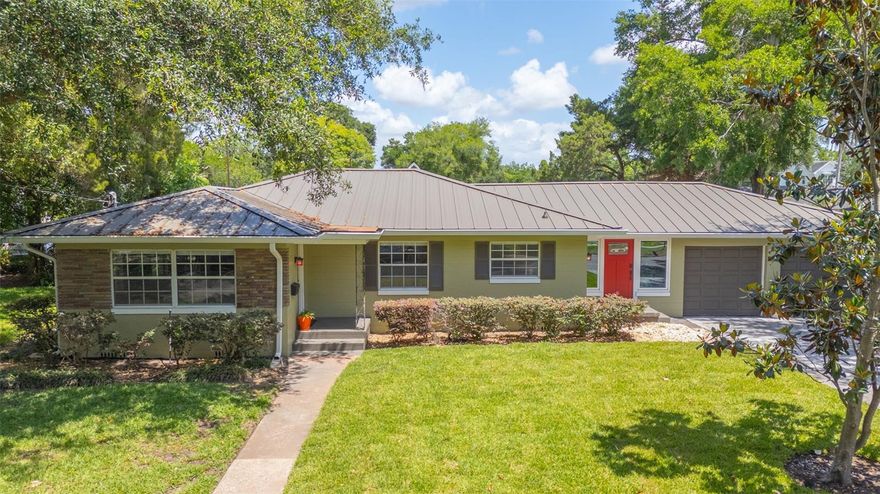 Welcome to this thoughtfully updated Winter Park home ideally on a spacious corner lot with a two-car garage offering excellent storage and everyday convenience. This home offers a flexible layout featuring two bedrooms plus an office that can function as a third bedroom, ideal for working from home or accommodating guests. Hardwood floors run throughout, adding warmth and character. Major system updates have been completed, including a 2024 metal roof and 2025 HVAC system, providing peace of mind for the next owner. Additional exterior improvements include new soffits and gutters, fresh exterior paint in 2025, a whole-home surge protector, and updated breezeway or office door and windows installed in 2024. Inside, you will find a well-equipped kitchen with Samsung appliances, including a range, microwave, dishwasher and a 2023 refrigerator, along with a 2020 Samsung washer and dryer. Comfort and efficiency have also been enhanced with replaced air ducts in 2016, an Ecobee smart thermostat and updated ceiling fans. Smart home features include a Logitech Circle View wired doorbell, smart blinds and updated smoke detectors, providing modern convenience throughout the home. The property sits toward the rear of the lot, creating a private, fenced yard space ideal for pets, outdoor enjoyment or entertaining. An irrigation system is also in place to help maintain the landscaping. In the desirable Winter Park area and zoned for highly regarded Winter Park schools, this home offers a combination of location, updates and flexibility. With major systems addressed, this home presents a move-in-ready opportunity and being sold as is.