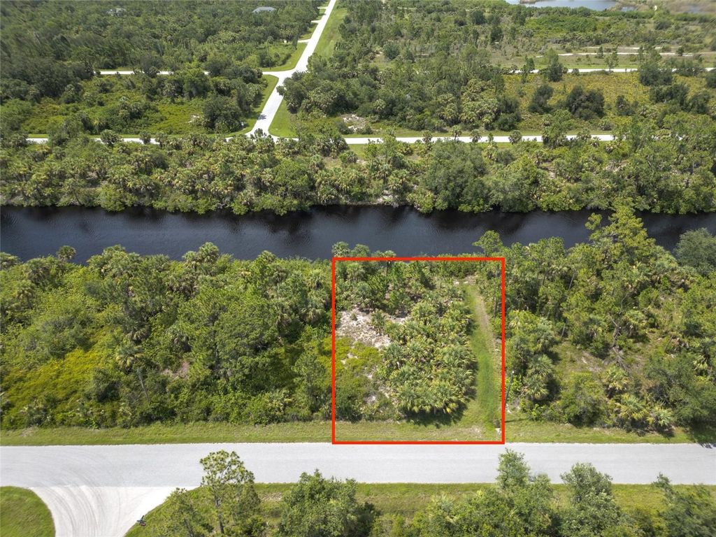 Photo of 14280 Mcclellan Avenue, Port Charlotte, FL 33953 (MLS # O6326389)
