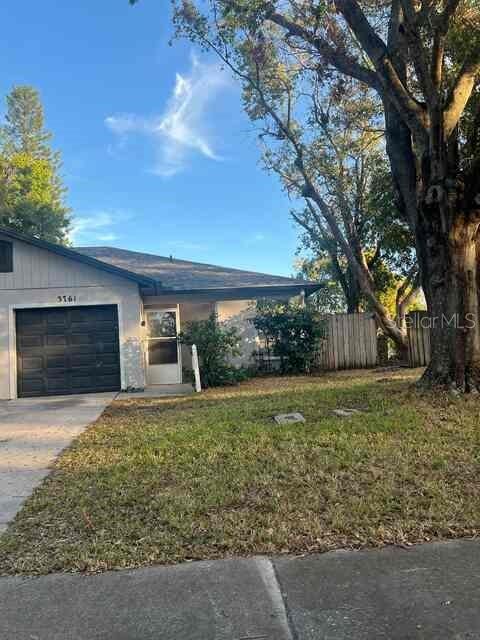 Photo of 3761 Lake Shore Drive, Palm Harbor, FL 34684 (MLS # W7888148)