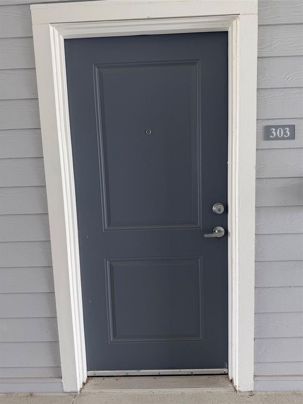 Photo of 510 Academy Drive #303, Kissimmee, FL 34744 (MLS # O6397730)