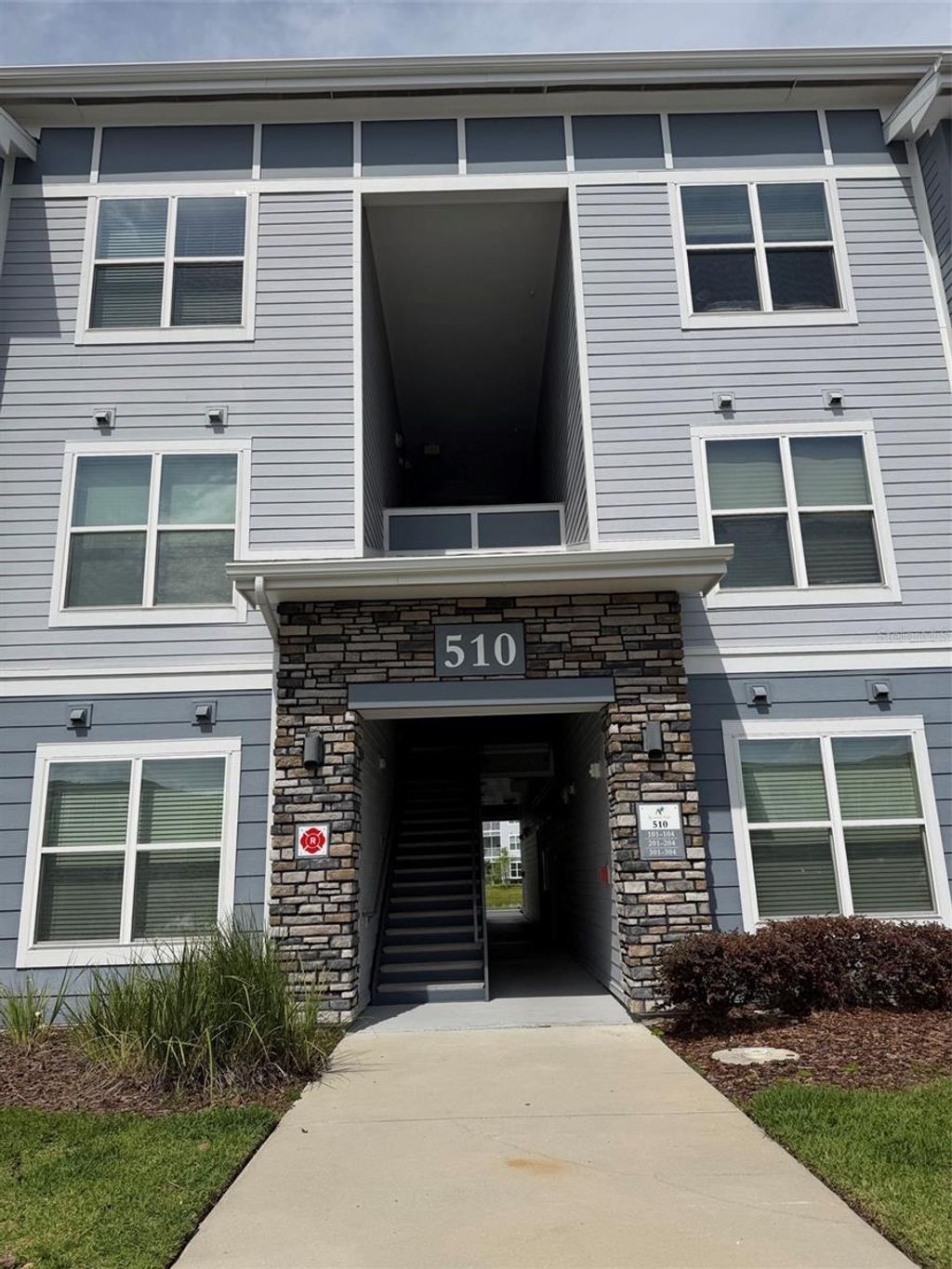 Photo of 510 Academy Drive #303, Kissimmee, FL 34744 (MLS # O6397730)