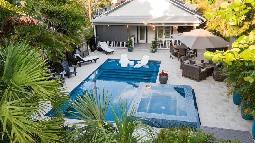 Luxury pool home located on desirable Sunset Beach in Treasure Island is the perfect getaway. Your steps away from the pristine Gulf of Mexico beaches. If you're looking for the best, this beach house is for you! Breathtaking sunsets await! Whether you're planning the ultimate honeymoon vacation or creating memories with family & friends, this beach house has it all! Attention to detail will follow you throughout the entire property. 3 gorgeous bedrooms and 3 full baths. You're sure to enjoy the soaker tub bath! Open floor plan offers plenty of space to gather. Top of the line furnishings, bedding, towels, cookware and accessories. The massive kitchen island is a favorite place to entertain and definitely caters to the gourmet at heart. Dining area seats 8 comfortably with additional island seating. The owner of this property has purchased the best for you to enjoy. If you're looking for a tranquil place to call home, this is your slice of paradise. Lush landscaping provides privacy. Breathtaking saltwater pool complete with fiber optic lighting and negative edge spa. Pool is both heated for cooler months and also has chiller for hot summer days. Swim shelf has pool loungers and plenty of water seating surrounding the pool. The outdoor seating is a tranquil place to relax. Enjoy the covered porch with outdoor TV. If you enjoy reading, grab your favorite book and head to the porch swing.  Large seating area with firepit table. Outdoor dining area also features a center firepit. Outdoor shower to rinse off after a great day at the beach. Private patio and seating area off master bedroom 2. This is a must-see property! Ask about off season weekly summer rates.