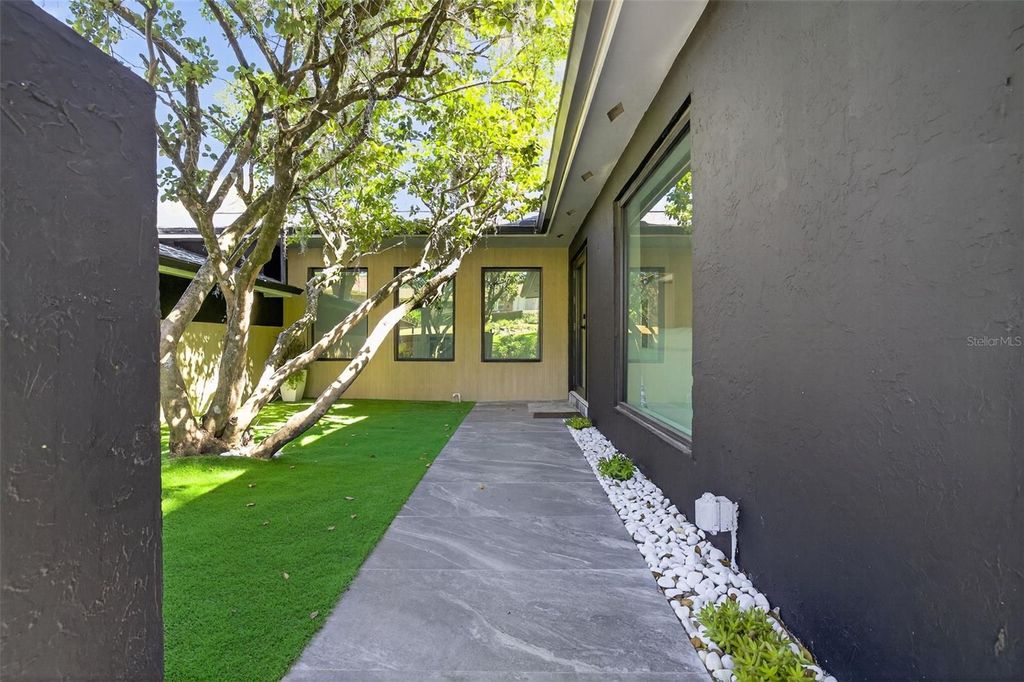 Photo of 511 S Riverhills Drive, Temple Terrace, FL 33617 (MLS # W7880956)