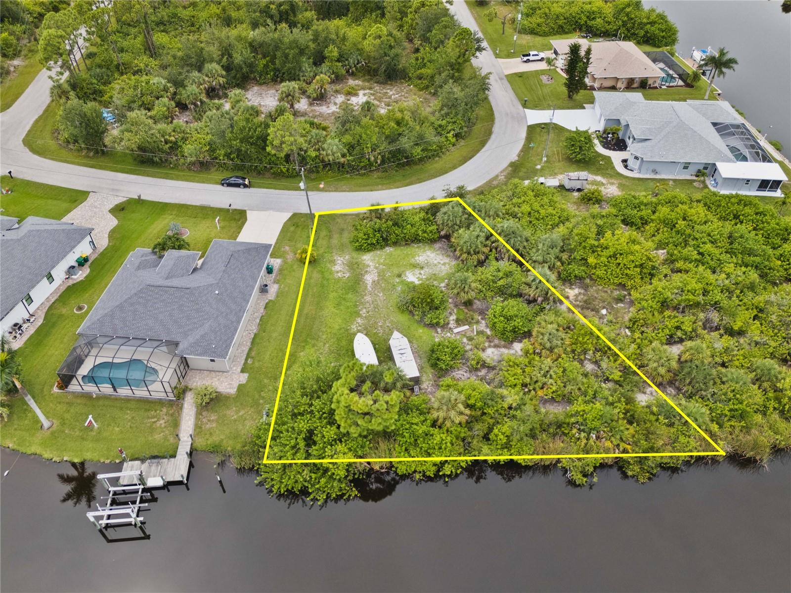Oversized Gulf-Access Lot with 160 Feet of Waterfront in South Gulf Cove! Ready to build or invest? This stunning oversized lot in growing South Gulf Cove is packed with potential! With a rare 160 feet of water frontage, this property gives you wide water views and easy access to the Gulf of Mexico—boating, fishing, and sunshine are right in your backyard. Enjoy the convenience of city water and sewer already in place, saving you time and money. Whether you're building now or holding for future growth, this is a prime piece of land in a fast-developing area. Located just a short drive from the world-famous Boca Grande and Englewood beaches, this lot puts you close to everything that makes Southwest Florida so special—sun, sand, and sea! Don’t miss this rare opportunity to own a premium waterfront property in one of the area’s most exciting communities. Call today and make it yours!