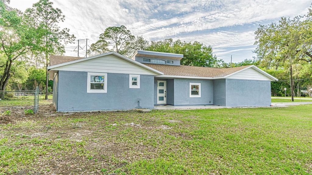 Photo of 1440 Walker Road, Lakeland, FL 33810 (MLS # TB8483201)