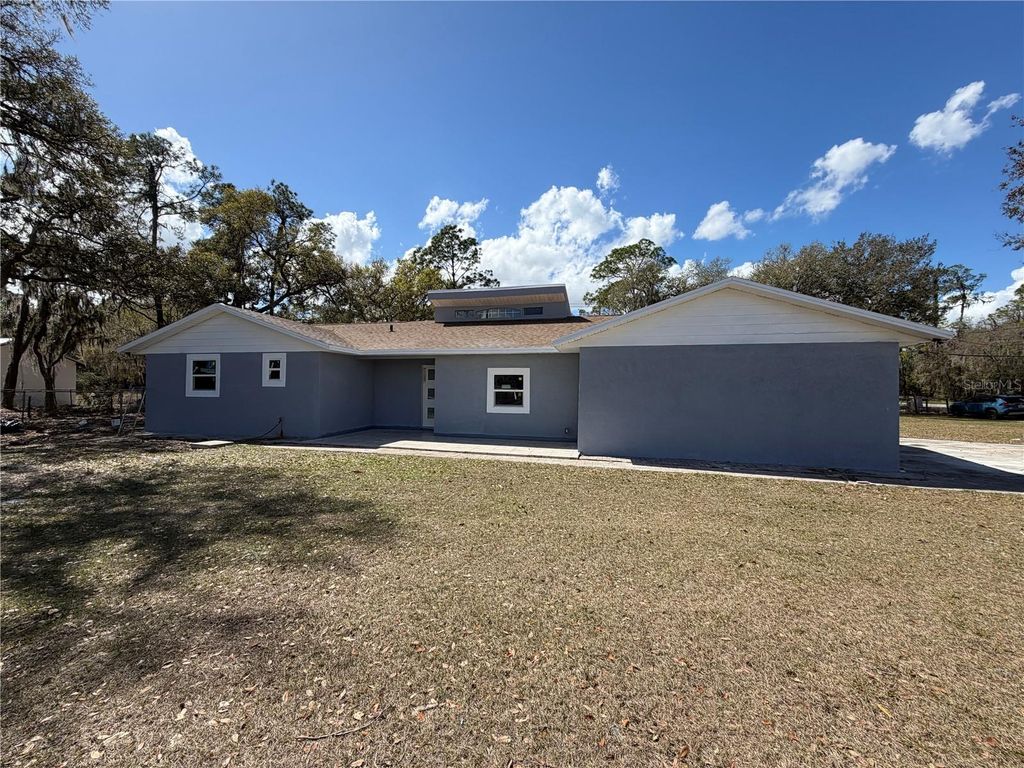 Photo of 1440 Walker Road, Lakeland, FL 33810 (MLS # TB8483201)