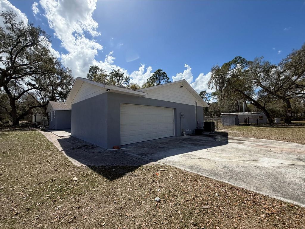 Photo of 1440 Walker Road, Lakeland, FL 33810 (MLS # TB8483201)