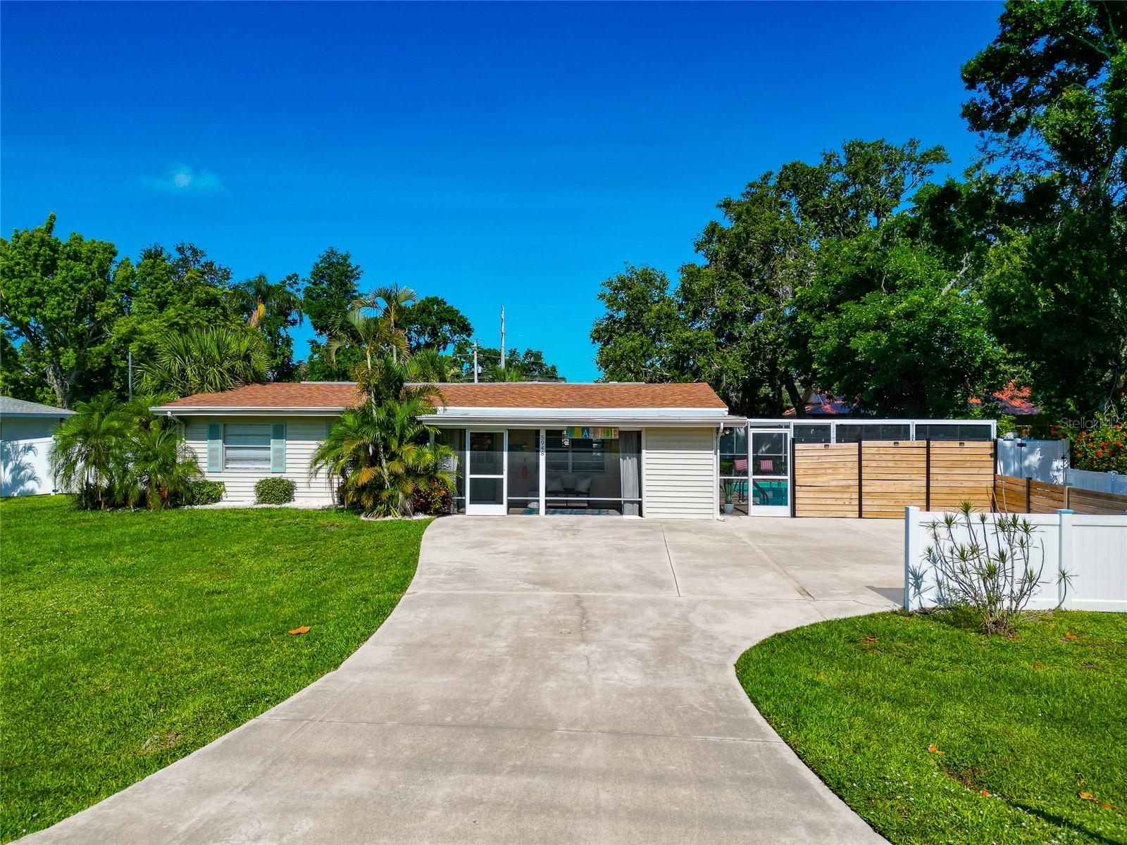 Welcome to your dream home or investment property in one of Sarasota’s most desirable neighborhoods—Gulf Gate! This beautifully partially updated 2 bedroom, 2 bathroom pool home is brimming with charm and designer-inspired furnishings, making it completely turnkey and ready for immediate enjoyment or rental income. Step inside to discover a bright and spacious layout, thoughtfully styled with modern touches and coastal elegance. The living and dining areas are beautifully separated by a stylish built in bookshelf, providing defined yet connected spaces for relaxing and entertaining. Outside, you’ll find your own private retreat—a large sparkling pool surrounded by lush landscaping, a very spacious fenced-in backyard and plenty of room for outdoor lounging or entertaining. Just minutes from the world-renowned Siesta Key Beach, as well as premier shopping, dining, and entertainment options, this home offers the perfect blend of convenience and lifestyle. Whether you’re seeking a permanent residence, a vacation getaway, or a high-performing short-term rental (with an impressive income history), this property is a rare opportunity in the heart of Sarasota. Recent updates include new 8x10 shed, new vinyl privacy fencing, lanai cage and lanai resurfacing (2019), new AC (2023), newer appliances, updated landscaping (2024), new washer and dryer (2024), a a roof that is only 6 years old—offering peace of mind and move-in-ready confidence. Don’t miss your chance to own a piece of paradise—schedule your private showing today!