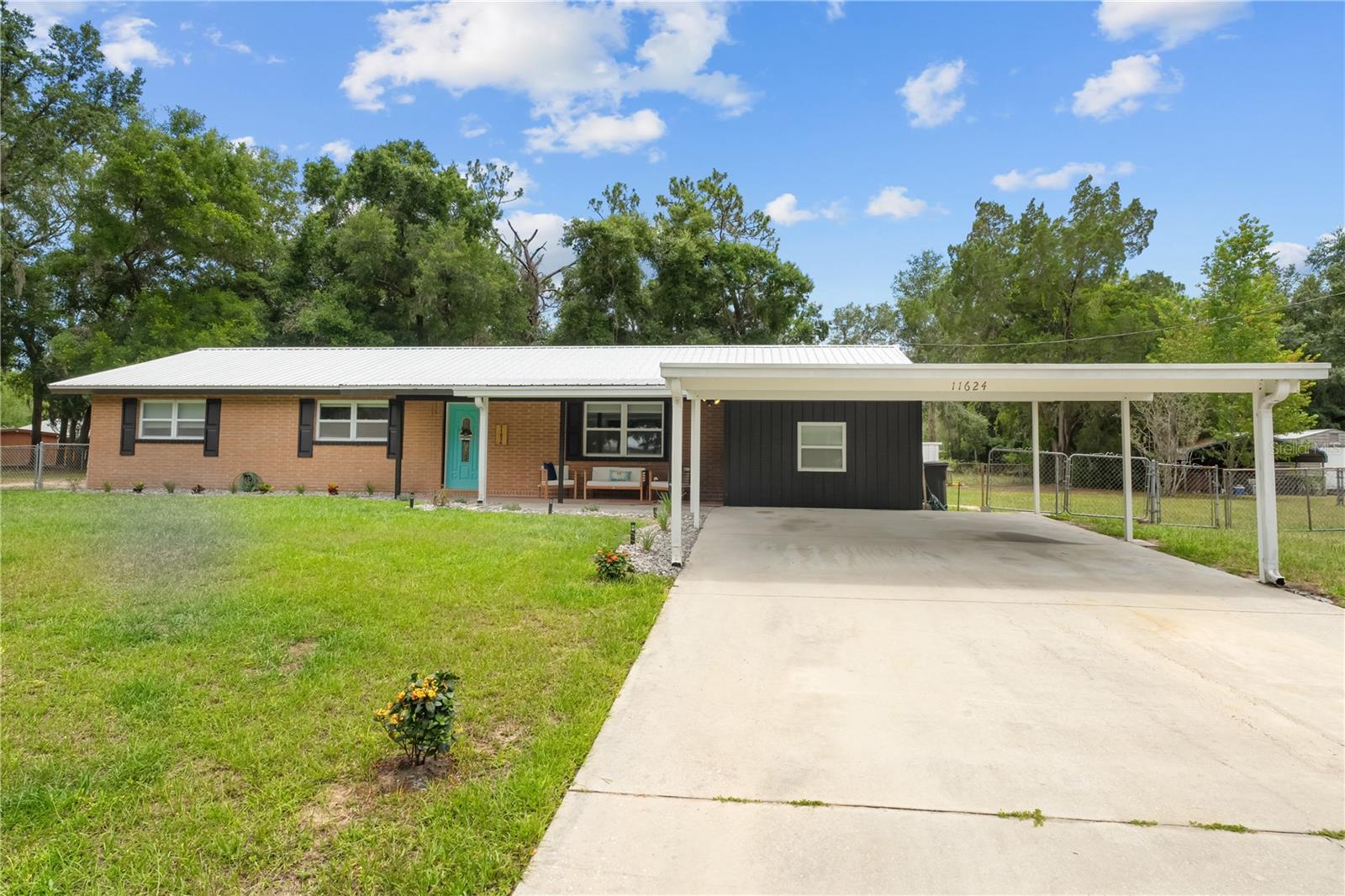 Welcome to this beautifully updated 3-bedroom, 2-bath country retreat located in the desirable Peaceful Acres community—NO HOA or CDD fees! located 15 minutes from downtown Dunnellon and 20 minutes from Crystal River, this home is situated in a prime location.
Currently operating as a successful Airbnb, this versatile home sits on just under half an acre of fully fenced land, with two additional parcels (.23 acres each) directly behind the property included in the sale, offering expansion potential or added privacy. Levy county has approved a mobile home, tiny home or a single family residence on either of the back lots included in the sale. This could be perfect for income, a mother in law suite or family compound!
Step inside to discover brand new luxury vinyl flooring (2025), a fresh interior and exterior paint job, and an updated kitchen and bathrooms (2021). The open-concept layout includes a spacious game/flex room, perfect for entertaining or hosting guests. Additional upgrades include a new A/C (2021), pool heater (2024), whole-home water filtration system (2025), and new drain field (2022)—giving you peace of mind and modern comfort.
Enjoy Florida living at its best with your private pool, a fun outdoor tiki bar, RV hookups, and even a hunter’s animal dressing station. Best of all, you’ll have public access to Lake Rousseau, which feeds into the stunning Rainbow River, just minutes away.
Whether you’re looking for a personal retreat, income-producing investment, or both—this property has it all.
