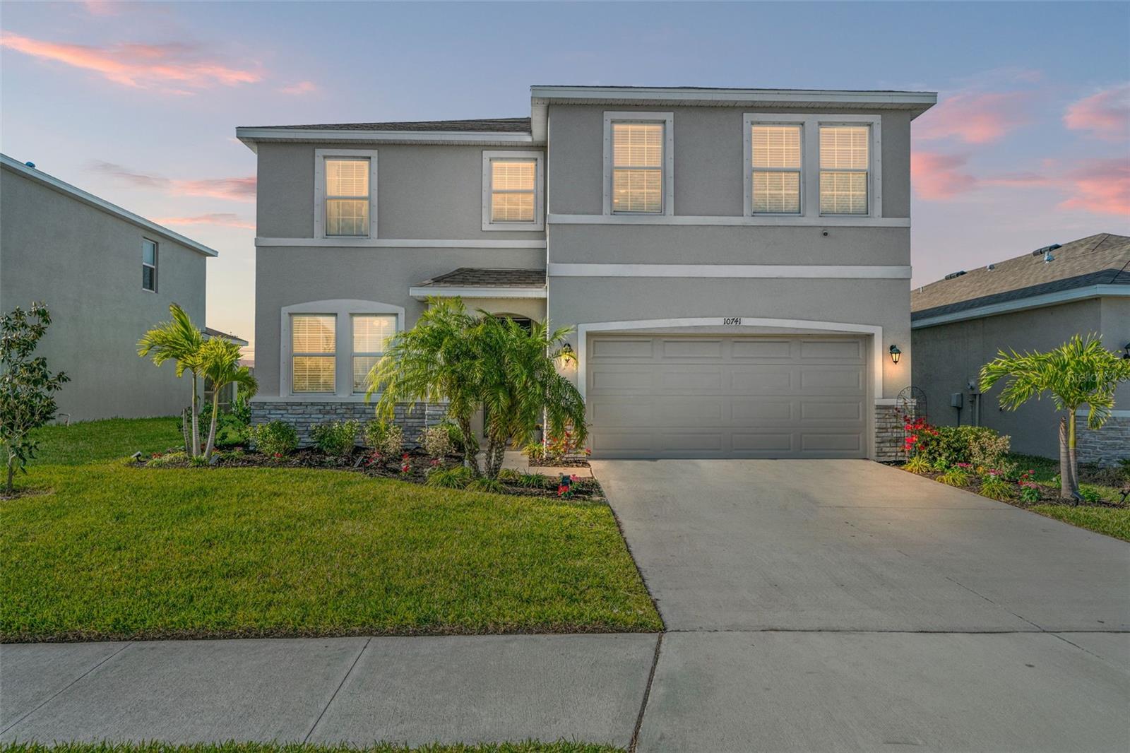 Currently occupied, please do not disturb tenants. All showings are by appointment only. Welcome to this exquisite home located in the highly sought-after Bella Lago community. As you enter through the front door, you will be greeted with new luxury vinyl plank flooring, a large office space, a full bathroom, a guest bedroom, living and dining area, kitchen and ample storage. The expansive open concept living area seamlessly integrates with the chef's dream kitchen, featuring newer stainless-steel appliances, a reverse osmosis system, granite countertops, and elegant white shaker-style cabinets. The subway tile backsplash and large corner walk-in pantry enhance both functionality and style. Upstairs, a spacious loft area provides the perfect setting for a home theater, additional office space, playroom, or home gym. The primary bedroom offers newer carpet flooring, two large walk-in closets, and a luxurious ensuite with a vanity featuring dual sinks, granite countertops, ceramic tile flooring, a tile walk-in shower, and a separate soaker tub. This level also includes two additional guest bedrooms, a laundry room, and a guest bathroom. The large, fully fenced backyard provides ample space for outdoor entertaining and privacy. You will love the privacy of the fully fenced yard and screened-in rear lanai overlooking a conservation area. Bella Lago offers an array of family-friendly amenities, including two clubhouses, pools, cabanas, a fitness center, a dog park, a playground, and a playfield. Conveniently located to downtown St. Pete, Lake Manatee State Park, Buffalo Creek Golf Course, shopping and easy access to I-75 and I-275. Call today to schedule your exclusive viewing.