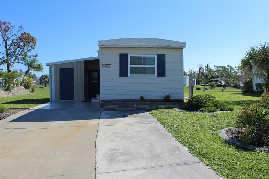 TROPICAL LIVING AWAITS!  This 1 bedroom, 1 -1/2 bath home is located in the sought-after Village of Holiday Lake, a WATERFRONT COMMUNITY, with docks and its own boat ramp just minutes to open water, Charlotte Harbor and the Gulf of Mexico! Originally a 2 bedroom and the owners took down a wall to make for an oversized living room.  The buyer could easily put up a wall and turn back to a 2 bedroom, if desired. This home offers UPDATED DOUBLE TINTED WINDOWS THROUGHOUT, a NEW ROOF AND NEW VAPOR BARRIER & TIEDOWNS.  This property has an updated kitchen, newer washer and dryer and 2 sheds.  The AIR CONDITIONER IS A 2021. This property used to be a 2 bedroom and the homeowner took down a wall to make a larger living room and added a small room off the master bedroom  as a half bath and closet. This property has 2 sheds. One is used for a laundry room and the other is much bigger and can be used for storage. There are some areas that will need a new subfloor.  If you are a golfer you will enjoy some of the area's finest GOLF COURSES all within a couple of miles from home. The Village of Holiday Lake boasts 25+ boat slips, beautiful pool area with 2 pools and BBQ area. There is always something going on at the large recreation hall with full kitchen, craft room, fitness center, laundry facility along with areas for woodworking, tennis, pickleball, shuffleboard and more. Golf Carts welcome. The outdoor enthusiast in you will love the closeness of boating and fishing from the community docks and boat ramp. You will also find several Gulf Shore Beaches close by. The foodie in you will love the local delights like Gerry’s Tiki Hut, TT’s Tiki on the Water and the Sandbar Tiki & Grill all of which can be accessed by boat or by car. The Village is perfect for year round living or a winter get away spot.
