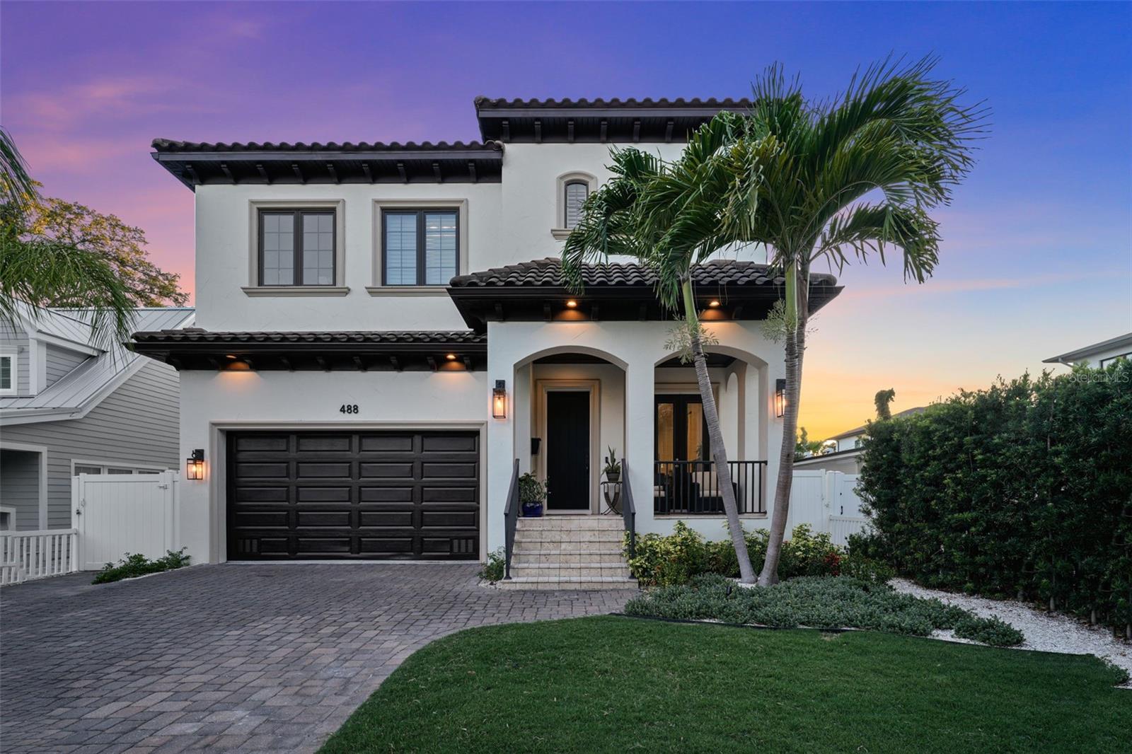 Beautiful, move in ready, single family home for sale on Davis Island. Built in 2015, this 6 bedroom, 4 bath boasts over 3,700 square feet with a full bedroom and bath on the first floor and a heated saltwater pool perfect for enjoying the Florida lifestyle! Upon walking in, there is a spacious dining room that flows into an open concept floor plan downstairs. The main living area includes a gas burning fireplaces and is open to the chef's kitchen. The kitchen is equipped with all upgraded Kenmore Elite appliances including a gas range, wine fridge, double oven and Wellborn wood cabinets. The downstairs also features all modern light fixtures, crown molding and 7 1/2" baseboards. Right off the main living are there is an extra bedroom and full bath-- perfect for a guest room or home gym or office. At the top of the stairs, there is a cozy loft area, perfect for an open office or sitting area. The very large master bedroom has a custom built out closet, a spacious spa like bath with dual vanities, a spa like soaking tub, and a large walk in shower. Additionally upstairs are four full bedrooms (one that has a connecting jack and jill bathroom) and a large laundry room that has two washers and two dryers. This home also features a 2 car garage, hurricane windows and doors, and an elevated outdoor patio space with an outdoor grill. The heated saltwater pool is completely screen enclosed. There is a small, turfed side yard perfect for taking out pets and the current owners have added privacy landscaping in the backyard. This home has been well maintained and is truly move in ready for it's new owners! Located on beautiful Davis Islands with a rated schools, walking and bike paths, and just a short distance away from Davis Islands Village with many restaurants, shops, and bars. Bring your golf cart and enjoy the Island lifestyle with walking / biking paths, baseball fields, public tennis courts, public historic pool, two dog parks, a beach, public marina, and an airport. Additionally, located only minutes from Downtown Tampa, Water Street, Sparkman Wharf, and the Tampa Riverwalk, makes this neighborhood the most desired in South Tampa.