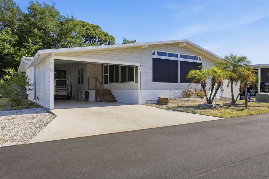 Welcome to Oyster Creek Mobile Home Park, a desirable waterfront 55+ community nestled along Oyster Creek with direct boating access to the Intracoastal Waterway and the Gulf of America. This beautifully remodeled 1-bedroom, 2 full bath home offers the perfect blend of comfort and coastal charm, ideal as a winter retreat or full-time residence. Inside, you’ll find two spacious living areas, a large family room, and warm wood accents that create an inviting atmosphere throughout. The oversized bedroom features two closets, including a walk-in, providing ample storage. Recent updates include a 2019 A/C, and best of all, the home is not located in a flood zone. Step outside to enjoy a large driveway and carport with plenty of room for guests, as well as a private, tree-lined backyard complete with a shed for additional storage. A golf cart is included, making it easy to explore this golf cart-friendly community. Residents enjoy low monthly HOA fees and access to fantastic amenities including a clubhouse, shuffleboard, horseshoes, boat ramp with kayak launch, dock, and storage for boats and trailers. Just a short ride away, enjoy Ann Dever Memorial Regional Park with its pool and scenic nature trails, or head to Manasota Key for four beautiful public beaches, excellent boating, and waterfront dining. Located in the heart of Englewood, this home offers the perfect opportunity to enjoy the relaxed Florida lifestyle.