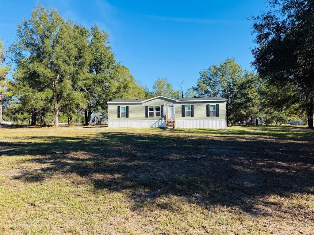 Photo of 16226 41st Place, Wellborn, FL 32094 (MLS # W7881450)