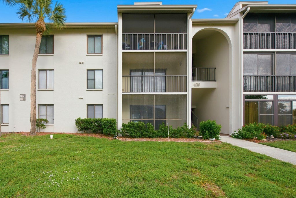 Photo of 1871 Pine Ridge Way W #E1, Palm Harbor, FL 34684 (MLS # TB8556171)
