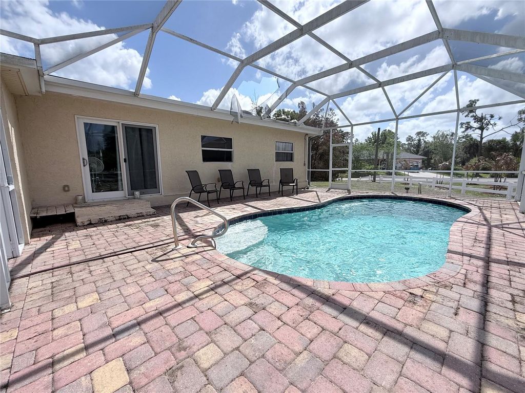 Photo of 2613 Vizza Lane, North Port, FL 34286 (MLS # C7524063)