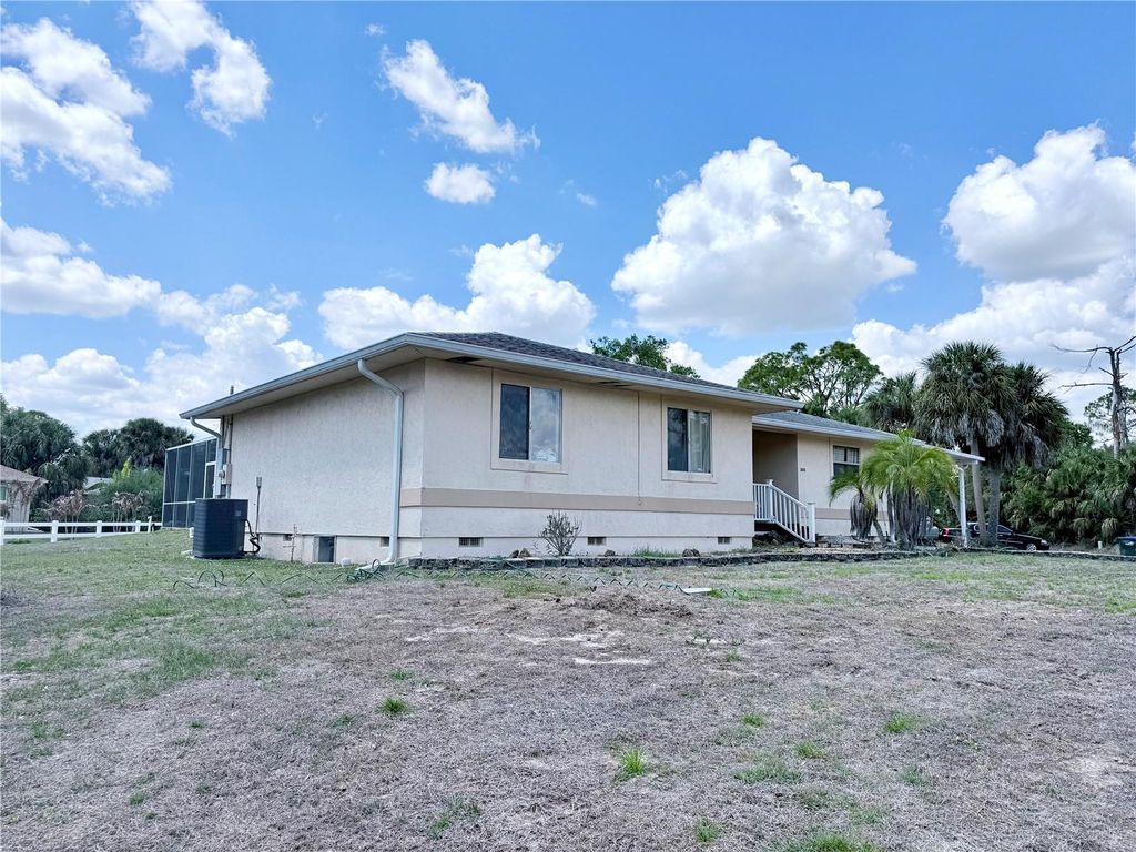 Photo of 2613 Vizza Lane, North Port, FL 34286 (MLS # C7524063)