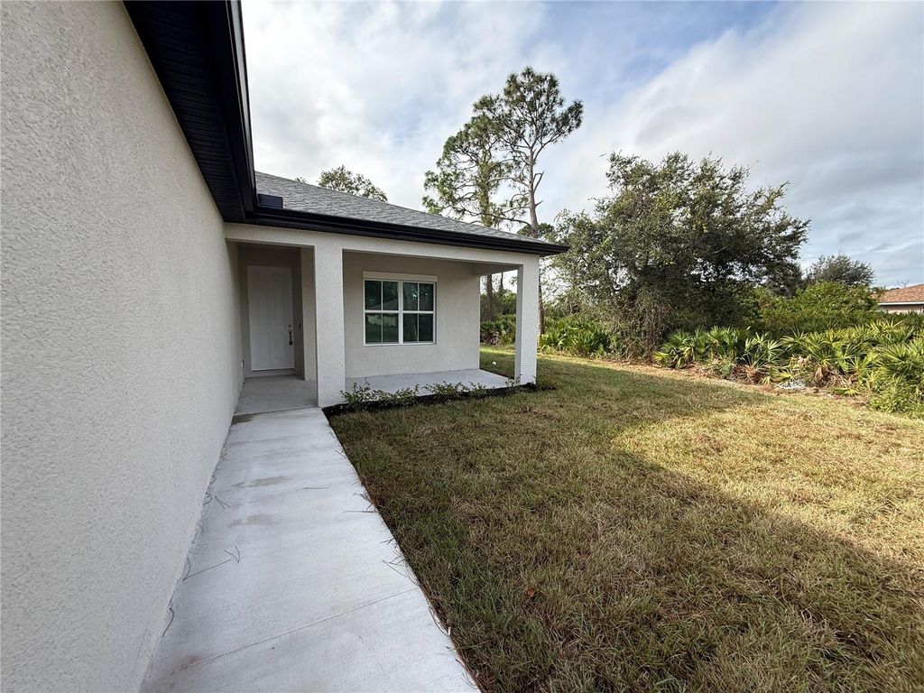 Photo of 1047 Comfort Lane, North Port, FL 34288 (MLS # A4676003)