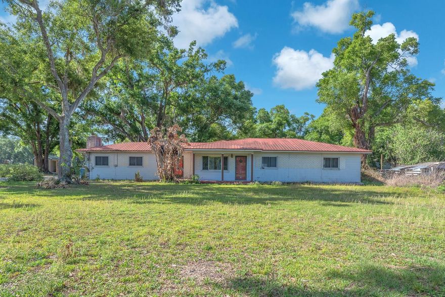 Attention investors, contractors, and rehab specialists—this property is being sold AS-IS and presents a unique opportunity in a desirable rural Plant City location. Situated on approximately 3.38 acres, this 4-bedroom, 2-bath home offers 2,716 square feet of living space and significant potential for renovation or redevelopment.
Built in 1959, the home is in need of major repairs. An attached carport is in place, and the property is equipped with electric service, well, and septic.
The expansive acreage provides ample room for future expansion, outbuildings, equipment storage, or possible redevelopment opportunities. With its peaceful country setting and wide-open space, the parcel offers flexibility for those looking to restore, rebuild, or re-imagine the property.
Conveniently located just minutes from Plant City’s shopping, dining, and everyday conveniences, with accessible routes for commuting throughout the Tampa Bay area.
This property is best suited for cash buyers, investors, or renovation specialists ready to take on a project and unlock its potential.