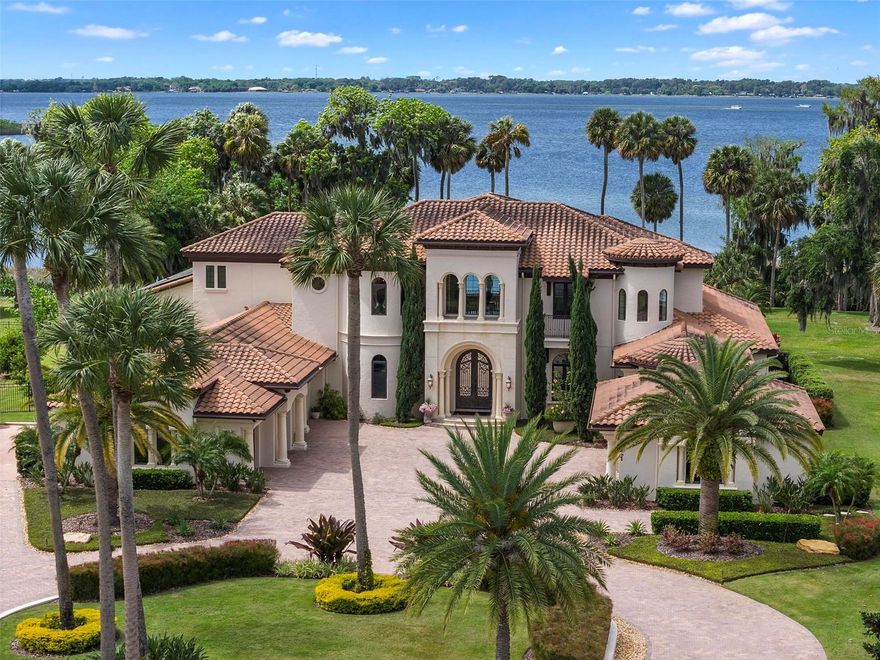 Luxurious lakefront 2015 Parade of Homes winner set on nearly two acres and 300 feet of shoreline located in picturesque Mount Dora.
