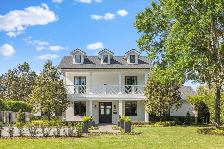 Welcome to 1563 Lakehurst, a stunning five-bedroom, 5.5 bath pool home that epitomizes luxury living and has been meticulously remodeled. This residence won the prestigious Orlando Parade of Homes 2021 first place and grand award and is a masterpiece of design and craftsmanship. Initially conceived by the local architect Gary Hancock, this home was reimagined by the renowned Ted Maines and Hardwick General Contractors, resulting in a comfortably elegant living space deserving of accolades and awards. On an oversized lot on a charming brick-lined street in one of the most desirable neighborhoods of Central Florida, this home boasts an enviable address just moments from shops and restaurants of Winter Park and Park Avenue. Spanning over 4,200 square feet, the main house offers spacious and inviting living areas flooded with natural light. Every detail was considered throughout the renovation: top-of-the-line Anderson windows, custom inset cabinetry, luxury bi-fold Origin door, designer lighting, engineered oak floors, solid-core interior doors, custom mahogany front door, and many more finishes discerning buyers will recognize and appreciate. The kitchen is the heart of the home, featuring Wolf and Sub-Zero appliances, extensive custom inset cabinetry, Cambria luxury quartz, and a center island spanning almost 20 feet. The separate breakfast bar allows quick and easy coffee, tea and breakfast prep without disturbing the clean aesthetics of the kitchen. The open living space has an Origin luxury bifold door for indoor-outdoor living, and a vaulted cathedral ceiling finished with designer lighting. The lounge and bar offer a pre-dinner retreat before using the artfully designed formal dining room, with smoked glass, dramatic navy wood paneling, and custom herringbone wood floor. The light-filled primary bedroom is also on the ground floor. Updated in 2022, this bedroom has Phillip Jeffries wall covering and Flos pendants. The bath has two independent vanities and separate closets. A full pool bath with shower, additional powder room and large office or flexible space complete the first story. Three additional bedrooms provide ample space for family or guests. The largest bedroom has an en-suite bath, and two additional bedrooms are connected by a large bath with a double vanity. For those needing additional accommodations, the in-law suite over the garage offers an additional 400-plus square feet of living space, ideal for guests or multigenerational living. The extensive back patio has multiple areas for dining, entertaining and enjoying Florida living. The summer kitchen was installed in 2021, and there is additional wine and refrigeration space. The front parking pad and landscaping were completed in spring 2024. All the systems are from 2020 or newer. The roof was installed in 2020, two tankless water heaters were added in 2020, upstairs and downstairs Carrier air conditioners are from 2023, the guest house air conditioning is from 2021, and the guest house water heater is from 2024. Drywall, ceilings and tongue-and-groove were replaced, the home was taken down to the studs, and has an effective date for the build as 2020. With its unparalleled location, luxury, and craftsmanship, this home is a rare find. Don't miss your opportunity to own a piece of Winter Park's finest. Schedule your private showing today!