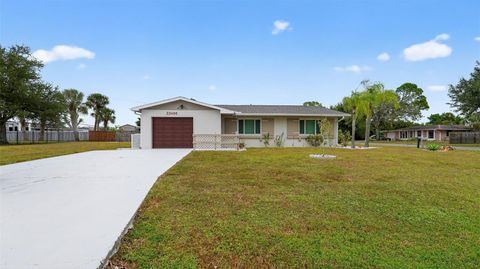 Photo of 22486 Olean Boulevard, Port Charlotte, FL 33952 (MLS # O6366326)