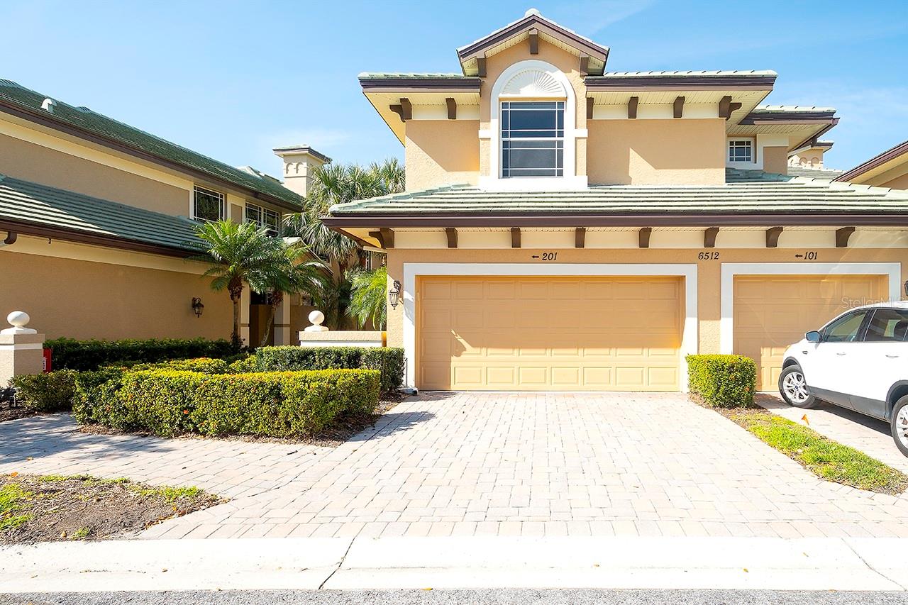 One or more photo(s) has been virtually staged. It’s all about the location! The Moorings at Edgewater, a gated community,
has the absolute best location with being just steps away to Lakewood Ranch
Main St where you will find restaurants, boutiques, movie theater, miniature
golf & where cultural & social events are ongoing. This 3 bedroom with 3 full
bath thoughtful floorplan is spacious and inviting with 2,344 square feet,
tray ceilings in both the family room and master bedroom and crown
moulding. The floorplan is open & lives all on one level making it ideal for
entertaining or relaxing. The eat-in kitchen features light colored on-trend
cabinetry with convenient SLIDE OUT WOODEN SHELVES, under-cabinet
lighting, granite countertops, prep island with extra storage underneath,
NEWER STAINLESS STEEL APPLIANCES in 2023, custom walk-in pantry &
flows into the large family room. NEW TILE ROOFS WERE INSTALLED IN
2022 throughout the community. The large windows throughout brighten
every room with natural light, enhanced with custom Hunter Douglas
Silouette blinds to enjoy each sunny day. The master suite opens up to
soaring ceilings & offers a walk-in custom closet. There’s extra space for
guest & family with the oversized 2rd bedroom that functions as a 2nd
MASTER or can double as a bonus room with an en-suite bathroom and walk
in closet with custom built ins. The 3rd bedroom with a custom closet is
convenient to the 3rd Full bathroom. The closet space throughout is
impressive plus a full separate laundry room features cabinetry and laundry
sink. The home also has a hard-wired alarm system and newly installed 10
year battery smoke detectors. Enjoy your private and spacious screened in
lanai with a long park like setting that brings the outdoors in with its
pocketing sliding doors that completely pocket. The full 2 car garage has an
extensive storage closet, convenient to store your large beach chairs and
other on-the-go outing needs. The Moorings resort style amenities offers
something for everyone with a community pool, fitness center, clubhouse,
private island with picnic area, fishing & boat docks. If you don’t stroll over
to LWR Main St, then it’s only a short drive to more shopping, dining, golf,
tennis, boating & our famous sugary white sand beaches. This unit will make
a great second home, investment property or primary residence where you
can start living like you are on vacation!