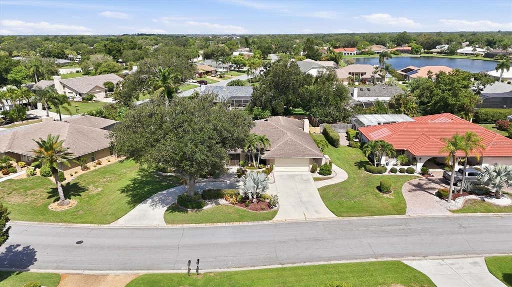 Photo of 5511 Country Lakes Trail, Sarasota, FL 34243 (MLS # A4700646)