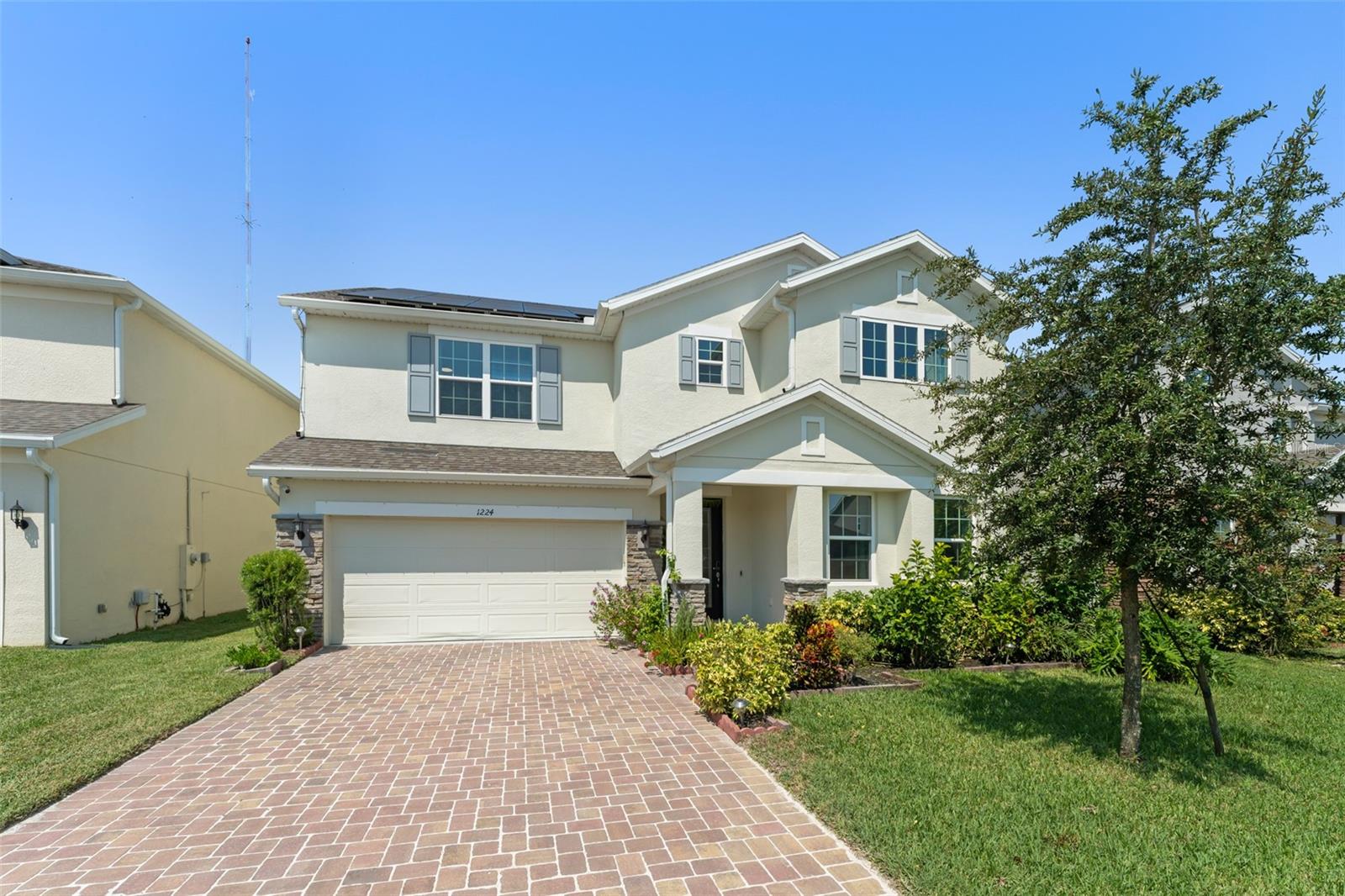 **This house comes with a REDUCED RATE through the seller's preferred lender. This is a lender-paid rate buydown that reduces the buyer's interest rate and monthly payment.** Welcome to this beautiful 5-bedroom, 3-bathroom home in the desirable Celery Oaks community, where thoughtful design and inviting spaces make everyday living effortless. The open Wilshire floor plan highlights TILE FLOORING THROUGHOUT THE MAIN LEVEL and expansive dual-pane windows that fill the home with natural light. A GOURMET KITCHEN with 42” CABINETRY, pantry, stainless steel appliances including a Samsung 4-door French door smart refrigerator, and breakfast bar seamlessly connects to the dining area, creating the perfect setting for casual meals or entertaining friends. On the first floor, you’ll find a spacious family room, a versatile second living room or office space, and a guest ensuite offering privacy and convenience. Upstairs, the DOUBLE-SIZED LOFT provides endless opportunities as a media room, playroom, or second gathering space, alongside four additional bedrooms including a PRIMARY SUITE with dual sinks and a generous WALK-IN CLOSET, and a laundry room. Step outside to a SCREENED LANAI overlooking an expansive yard, with plenty of room to add a pool, a playground or build your own OUTDOOR OASIS. Other features include an AO Smith Water Softener and an iSpring Water Filter System. Celery Oaks residents enjoy convenient access to the Riverwalk and downtown Sanford, Lake Monroe, Central Florida Zoo and Botanical Gardens, Spring Hammock Preserve, Seminole Towne Center, the Sanford International Airport, major medical facilities, and numerous dining, shopping and entertaining options. Schedule your private showing today!