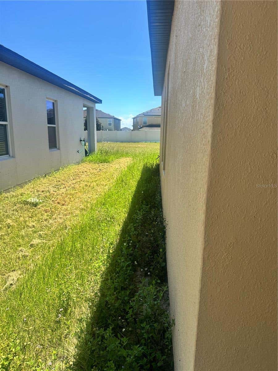 Photo of 487 Eaglecrest Drive, Haines City, FL 33844 (MLS # L4964146)